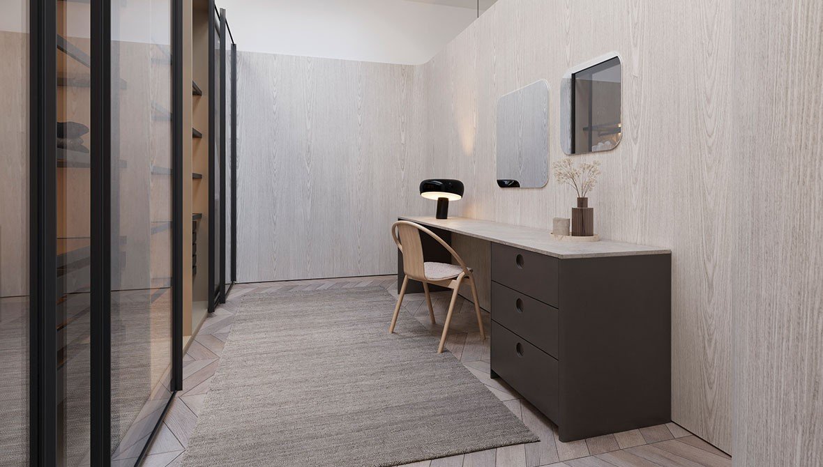 Closet planejado em L para otimização de um quarto pequeno.