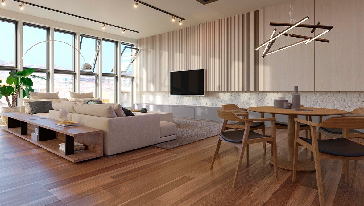 Sala de estar planejada com elementos de design biofílico, como plantas e tons de madeira natural.